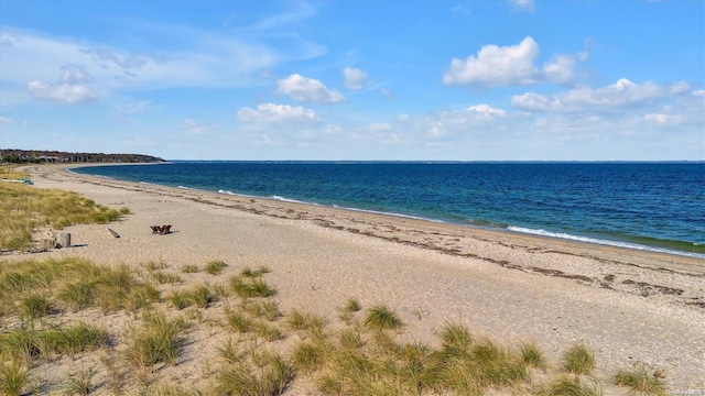 view of water feature with a beach view