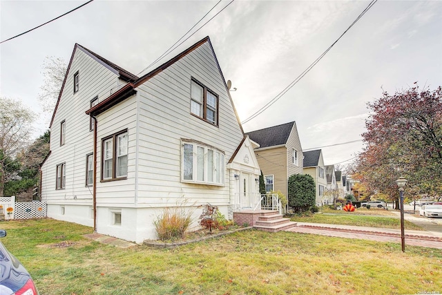 21 Fremont Rd, Valley Stream, NY 11581 - view of front of home featuring a front yard