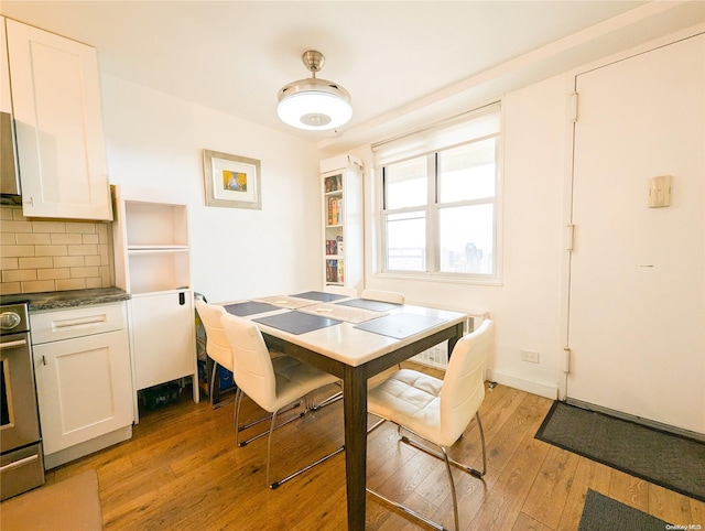 dining room with light wood-type flooring