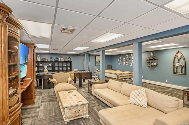 carpeted living room with a drop ceiling and billiards