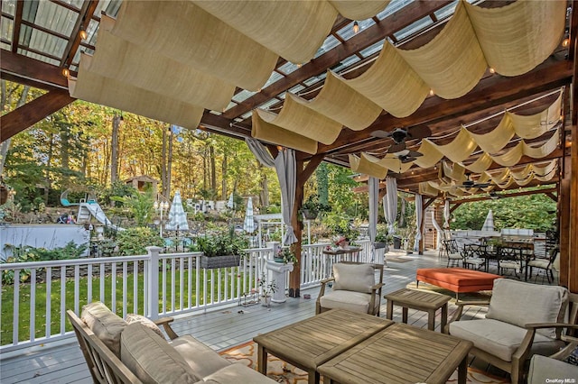 view of patio / terrace featuring ceiling fan and a wooden deck