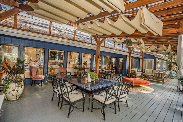 wooden deck with an outdoor living space, ceiling fan, and a pergola