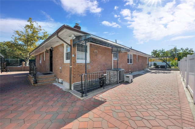 view of front of home featuring a patio