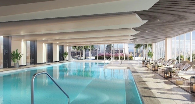 view of swimming pool with a patio