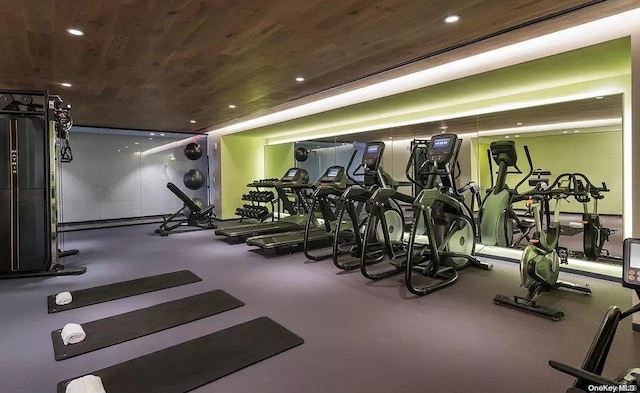 exercise room with wooden ceiling