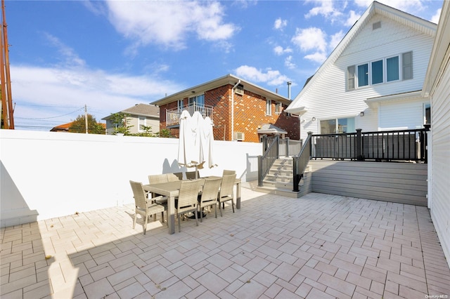 view of patio / terrace featuring a wooden deck