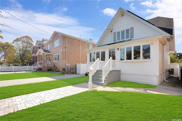 view of front facade with a front lawn