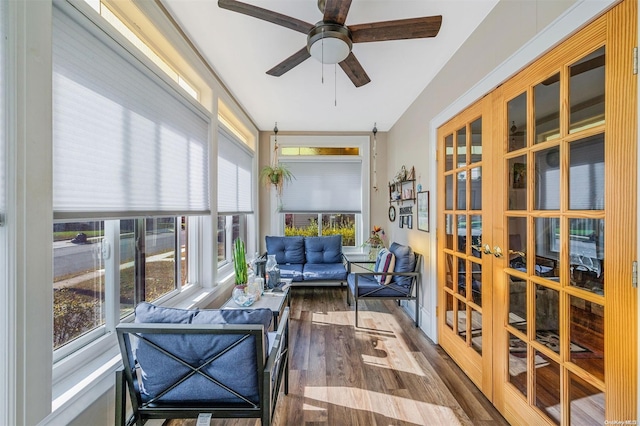 sunroom / solarium with ceiling fan