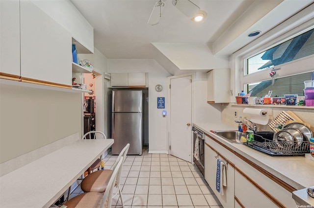 kitchen featuring white cabinets and stainless steel appliances