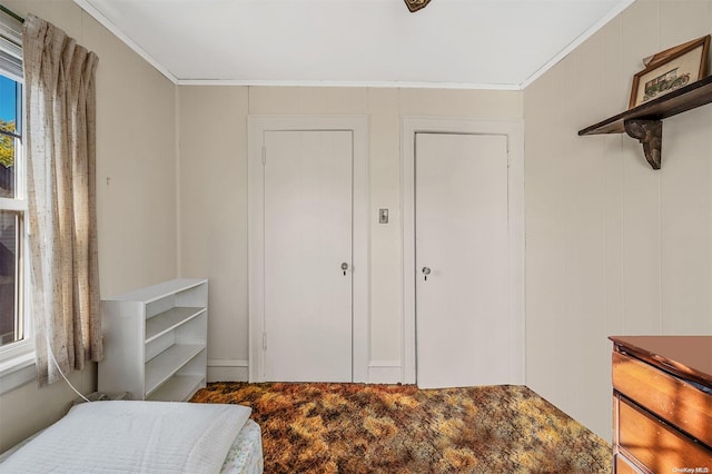 bedroom with ornamental molding