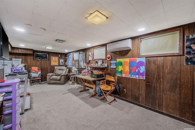 carpeted home office featuring wooden walls and a wall mounted air conditioner