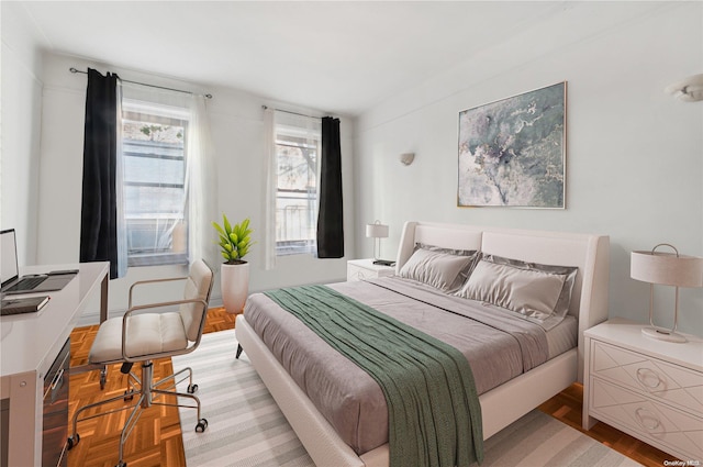 bedroom featuring light wood-type flooring