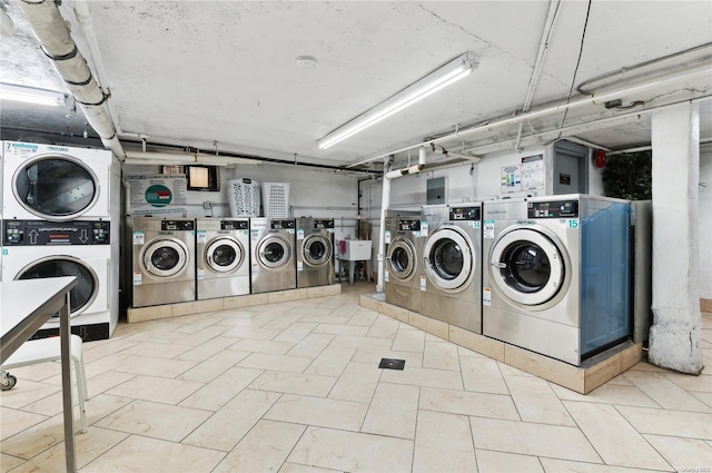 37-21 80th St Unit 3M, Jackson Heights, NY 11372 - community laundry featuring stacked washer / dryer and separate washer and dryer