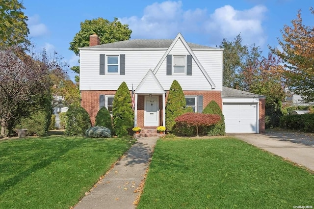 view of front facade featuring a garage and a front lawn