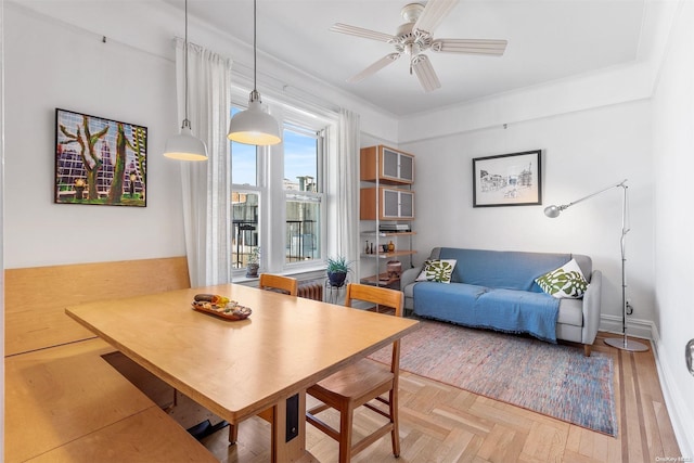 dining space featuring ceiling fan