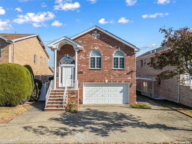 view of front of property with a garage