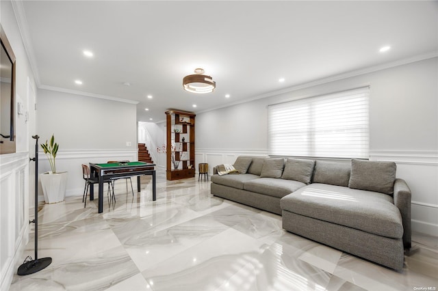 living room with ornamental molding