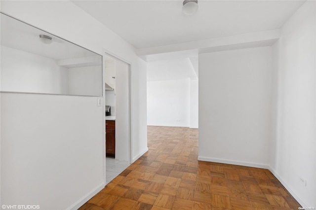 hallway with light parquet floors