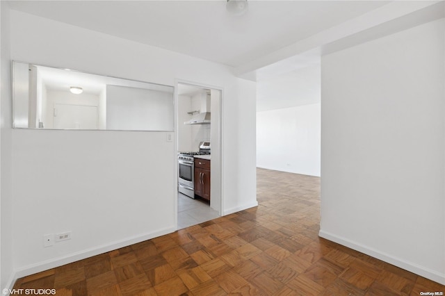 empty room with light parquet flooring