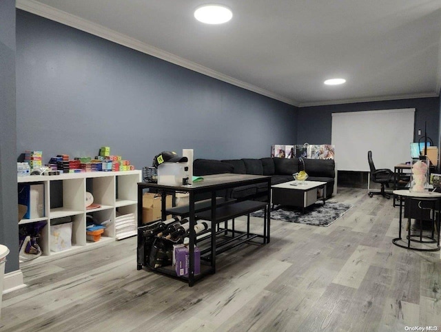 playroom featuring hardwood / wood-style floors and crown molding