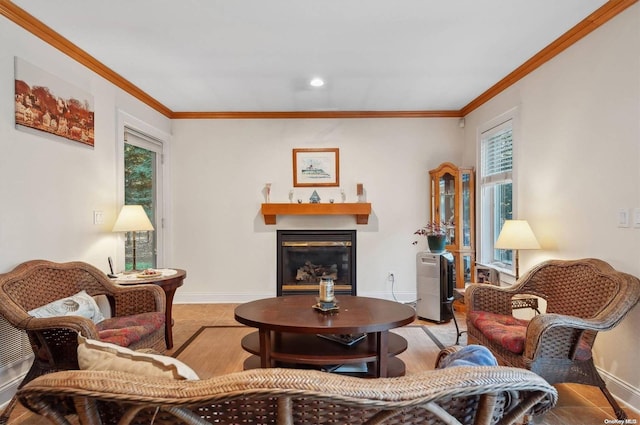 living room with light tile patterned floors, crown molding, and a healthy amount of sunlight