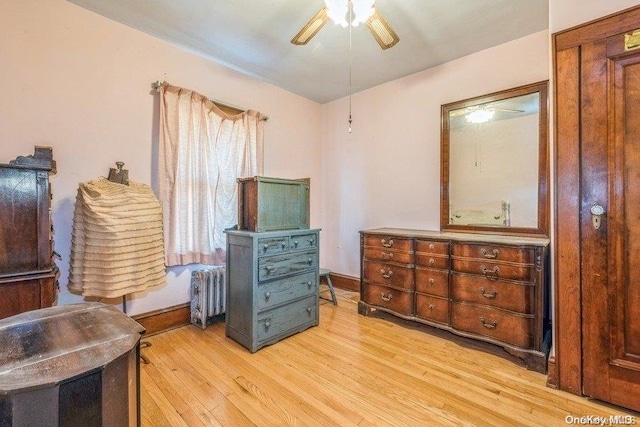 interior space with light hardwood / wood-style floors and ceiling fan