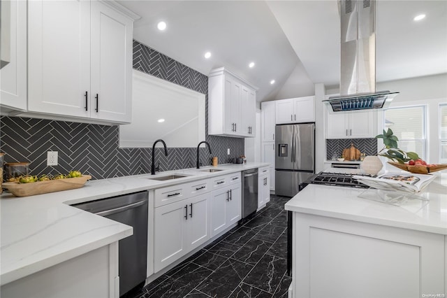 kitchen with white cabinetry, island range hood, and appliances with stainless steel finishes