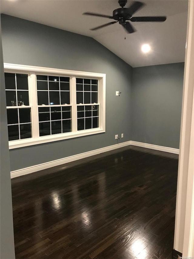 unfurnished room featuring ceiling fan, wood-type flooring, and lofted ceiling