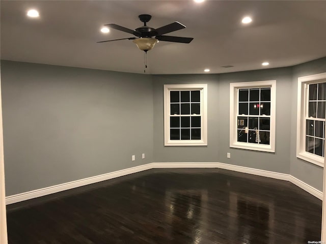 unfurnished room featuring hardwood / wood-style floors and ceiling fan