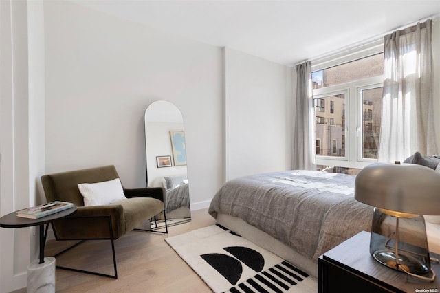 bedroom with light hardwood / wood-style flooring