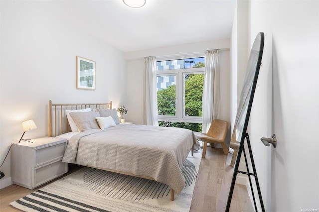 bedroom featuring light hardwood / wood-style floors