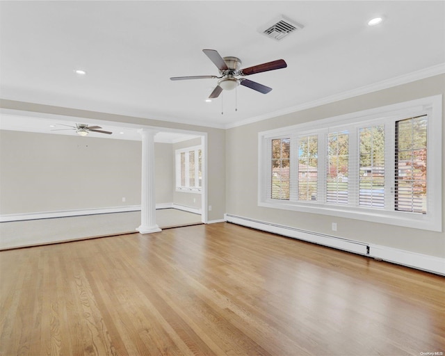 empty room with ornate columns, ceiling fan, crown molding, a baseboard radiator, and light hardwood / wood-style flooring