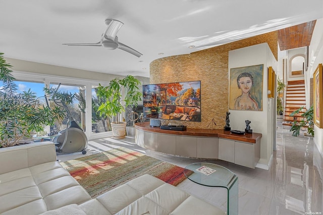 living room with ceiling fan