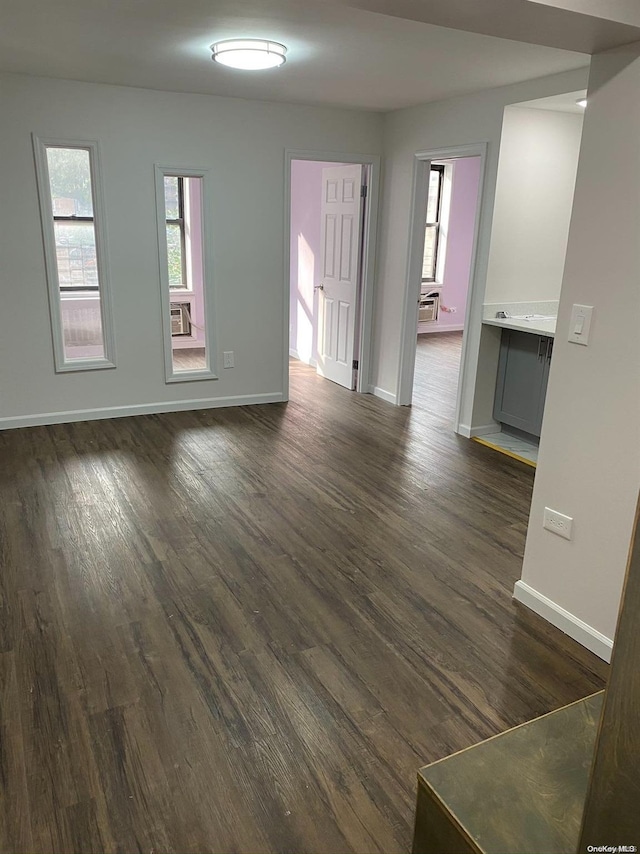 spare room featuring dark hardwood / wood-style floors