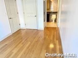 corridor featuring light hardwood / wood-style floors