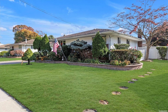 view of home's exterior with a yard