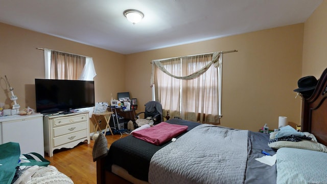 bedroom featuring light wood-type flooring