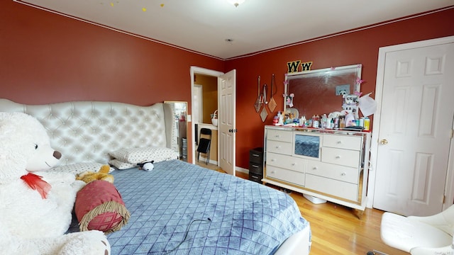 bedroom featuring hardwood / wood-style flooring