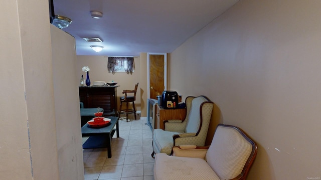 living area with light tile patterned flooring