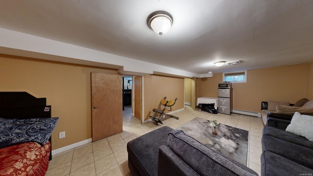 tiled living room with baseboard heating