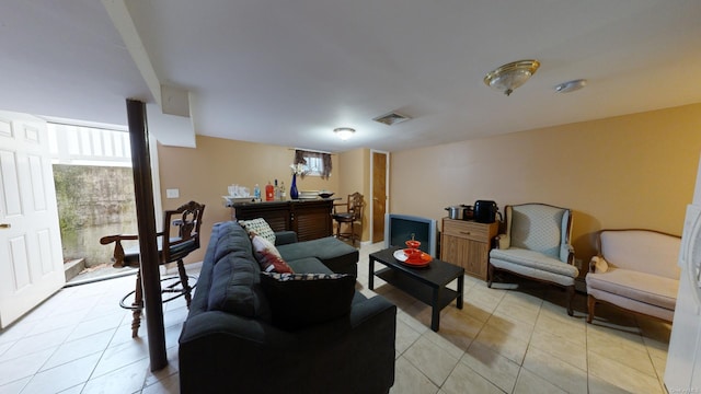 tiled living room with bar