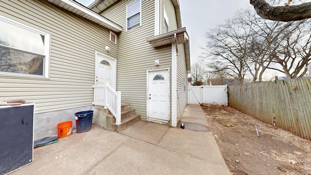 doorway to property featuring a patio area