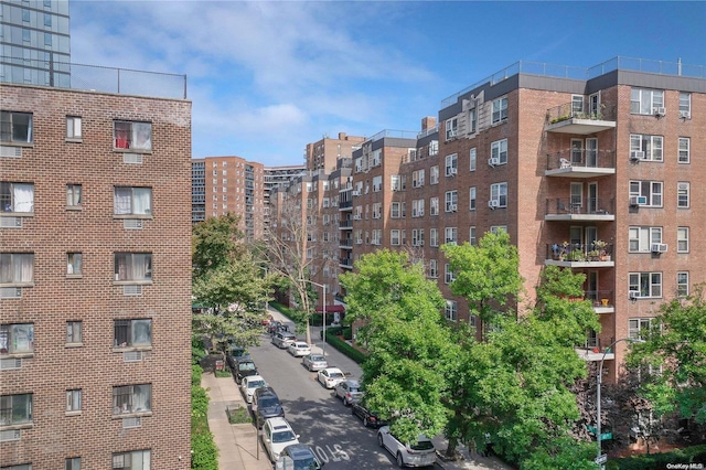 98-22 63rd Dr Unit 5-E, Rego Park, NY 11374 - view of apartment building / complex