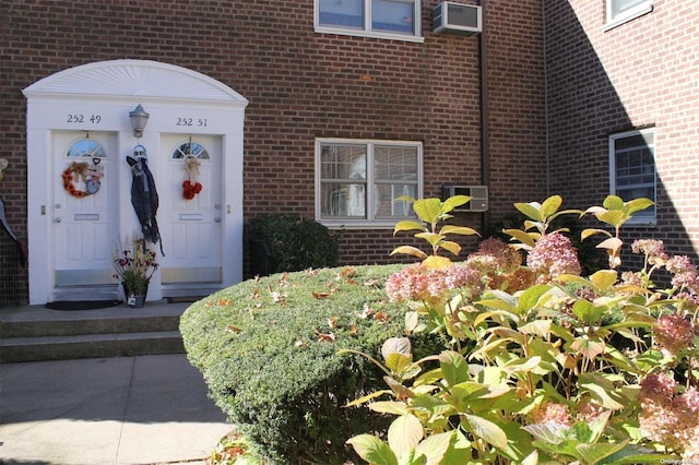 252-51 63rd Ave Unit 5A, Little Neck, NY 11362 - property entrance with brick siding
