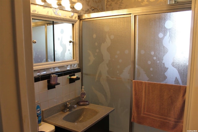 252-51 63rd Ave Unit 5A, Little Neck, NY 11362 - full bathroom with vanity, a shower with door, and tasteful backsplash