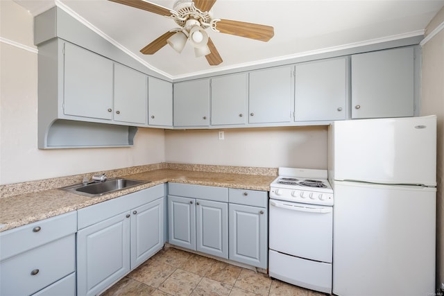 kitchen with ceiling fan, sink, white appliances, and ornamental molding