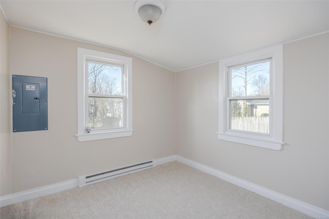 bonus room featuring electric panel, plenty of natural light, a baseboard radiator, and lofted ceiling