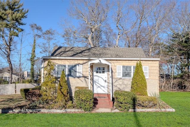 view of front facade with a front lawn