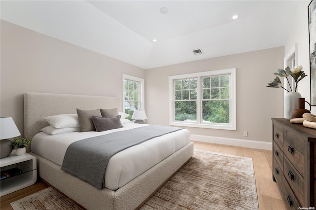 bedroom with light wood-type flooring