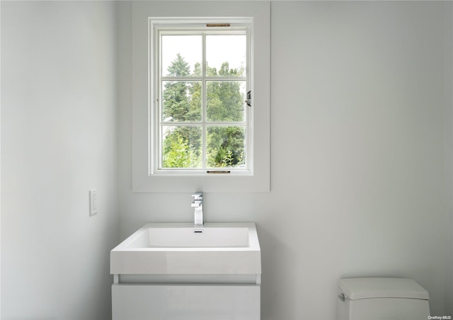 bathroom featuring sink and toilet